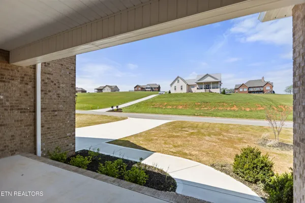 a view of a street with an ocean view