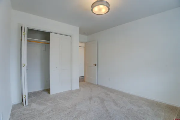 a storage room with washer and dryer