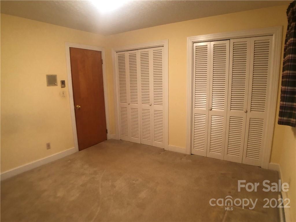 178 Skyview Ridge Rutherfordton, NC 28139 - Photo 13 of 43 an empty room with windows