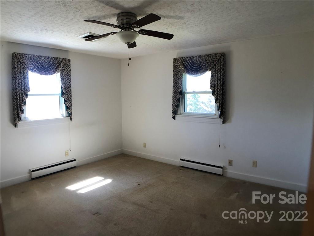 178 Skyview Ridge Rutherfordton, NC 28139 - Photo 18 of 43 an empty room with a window