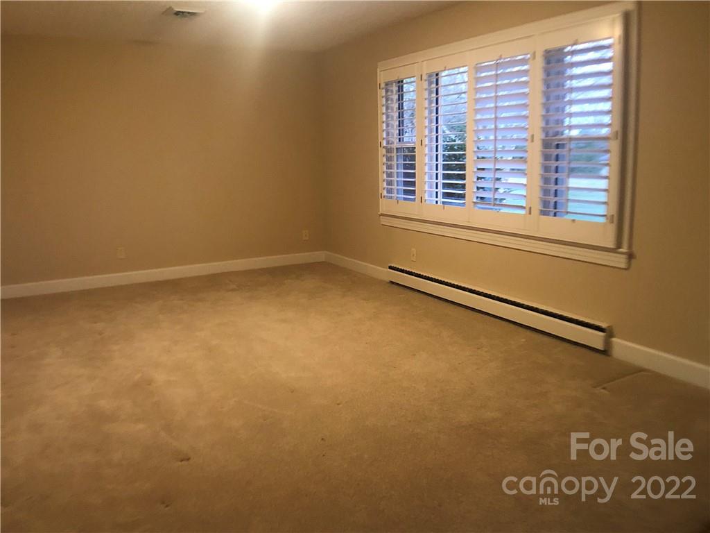 178 Skyview Ridge Rutherfordton, NC 28139 - Photo 7 of 43 a view of an empty room with a window