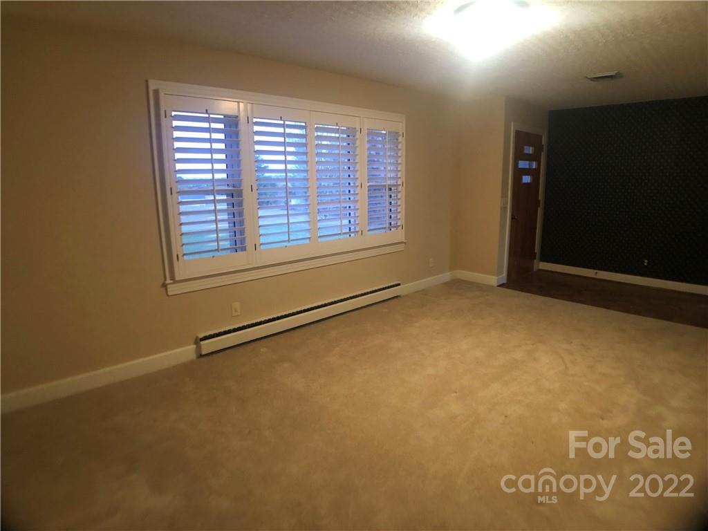 178 Skyview Ridge Rutherfordton, NC 28139 - Photo 8 of 43 an empty room with windows