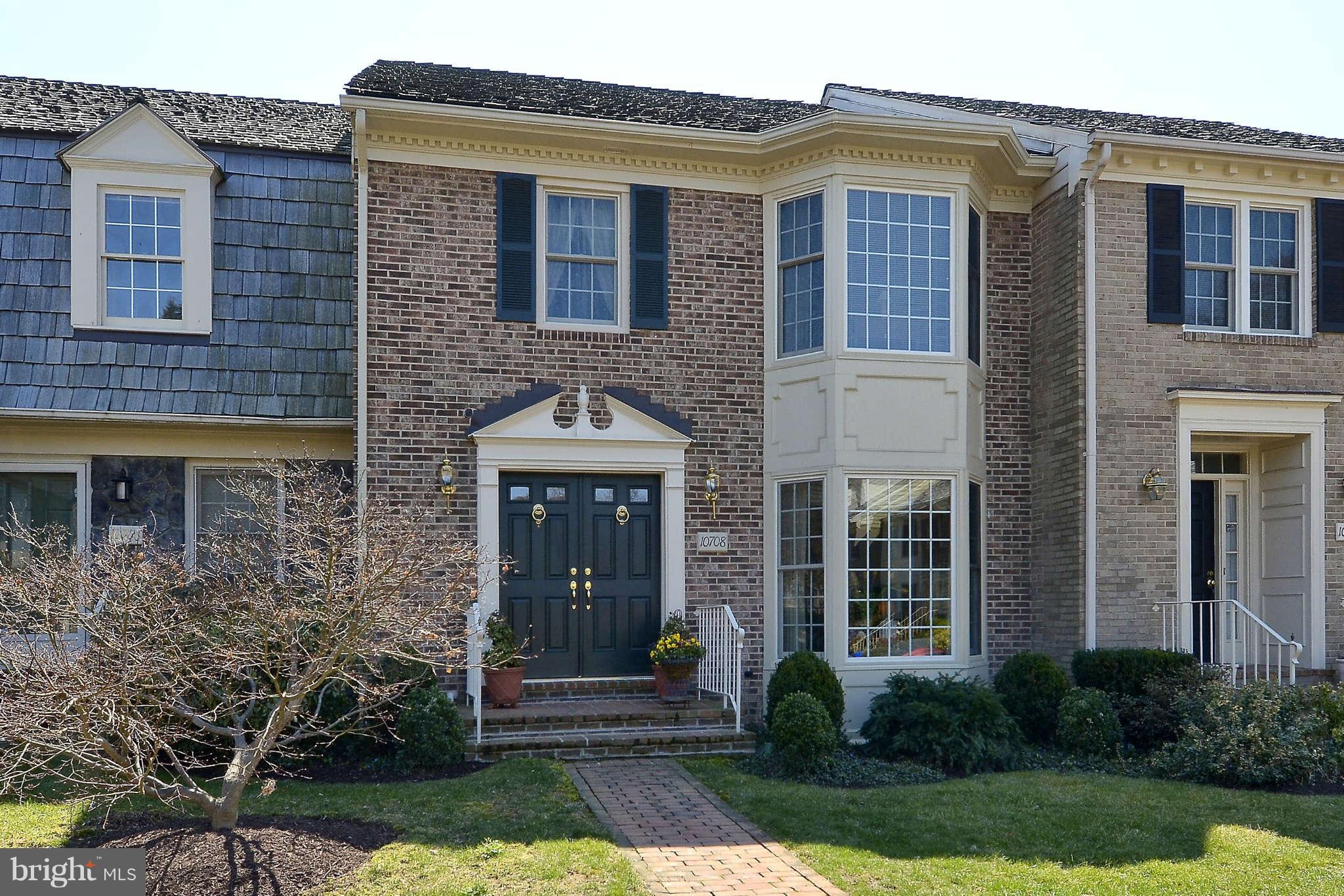 10708 Brewer House Road North Bethesda, MD 20852 - Photo 1 of 26 a front view of a house with garden