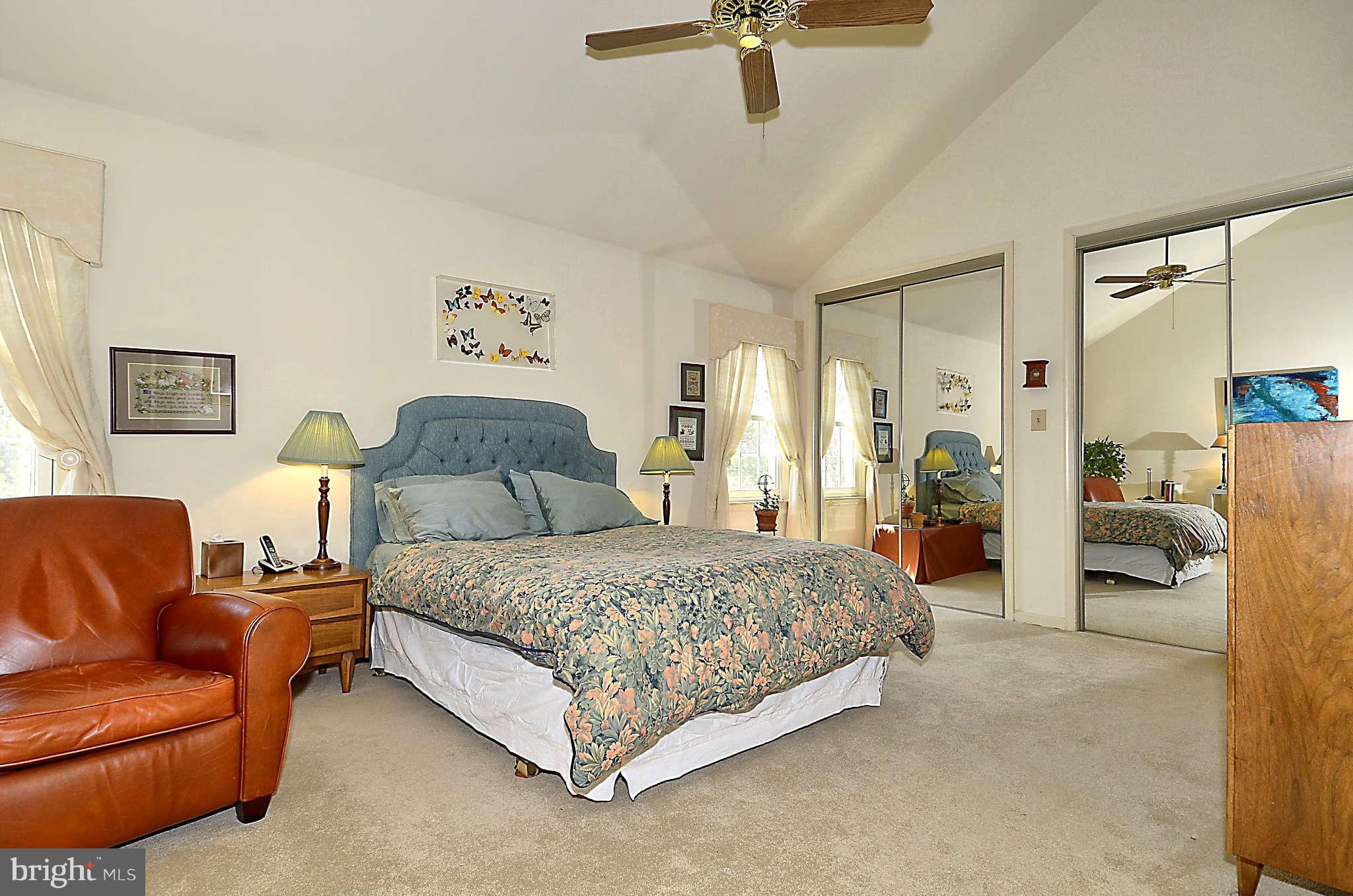 10708 Brewer House Road North Bethesda, MD 20852 - Photo 13 of 26 a bedroom with a bed couch and window