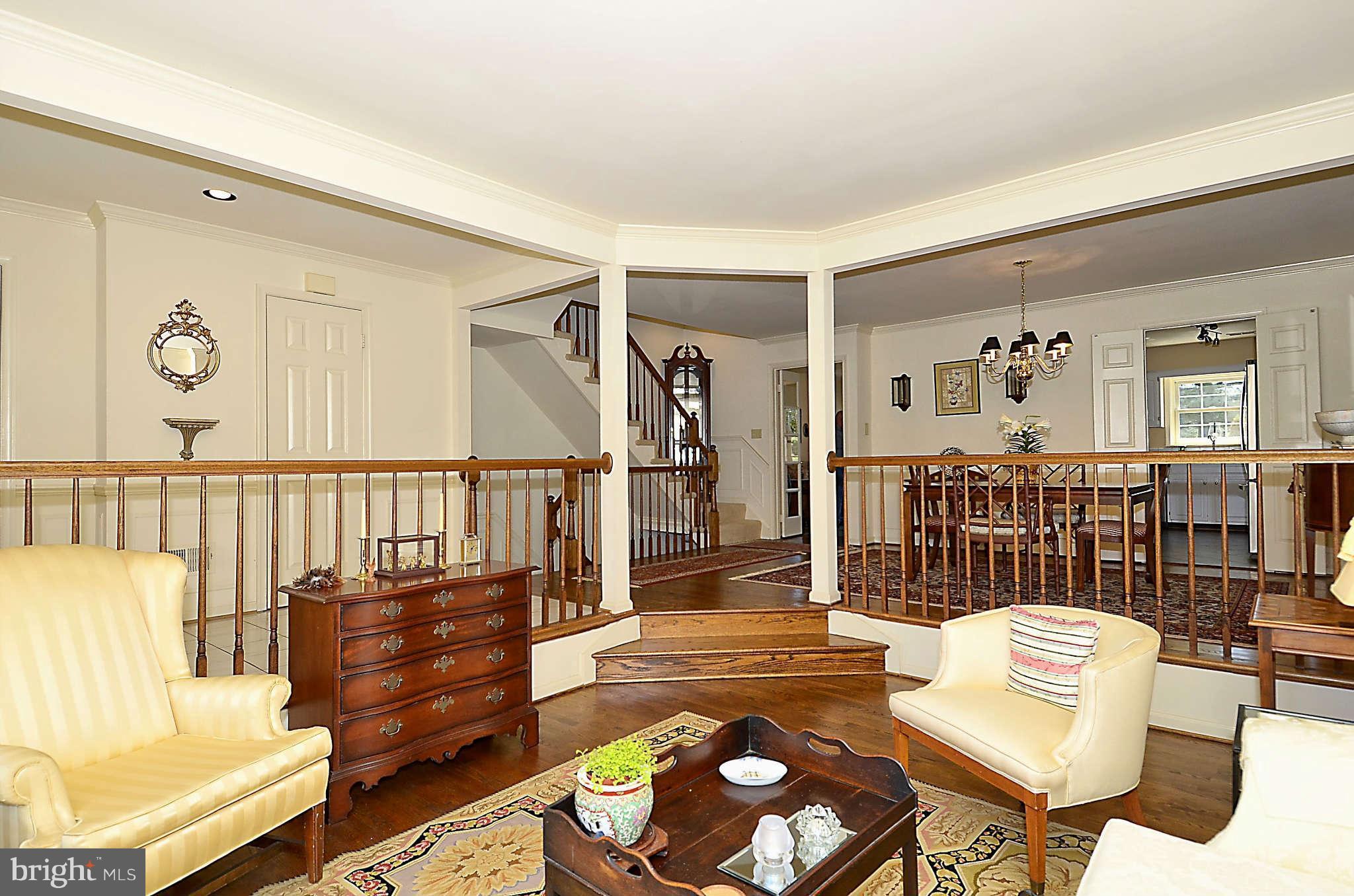 10708 Brewer House Road North Bethesda, MD 20852 - Photo 3 of 26 a living room with furniture and a rug