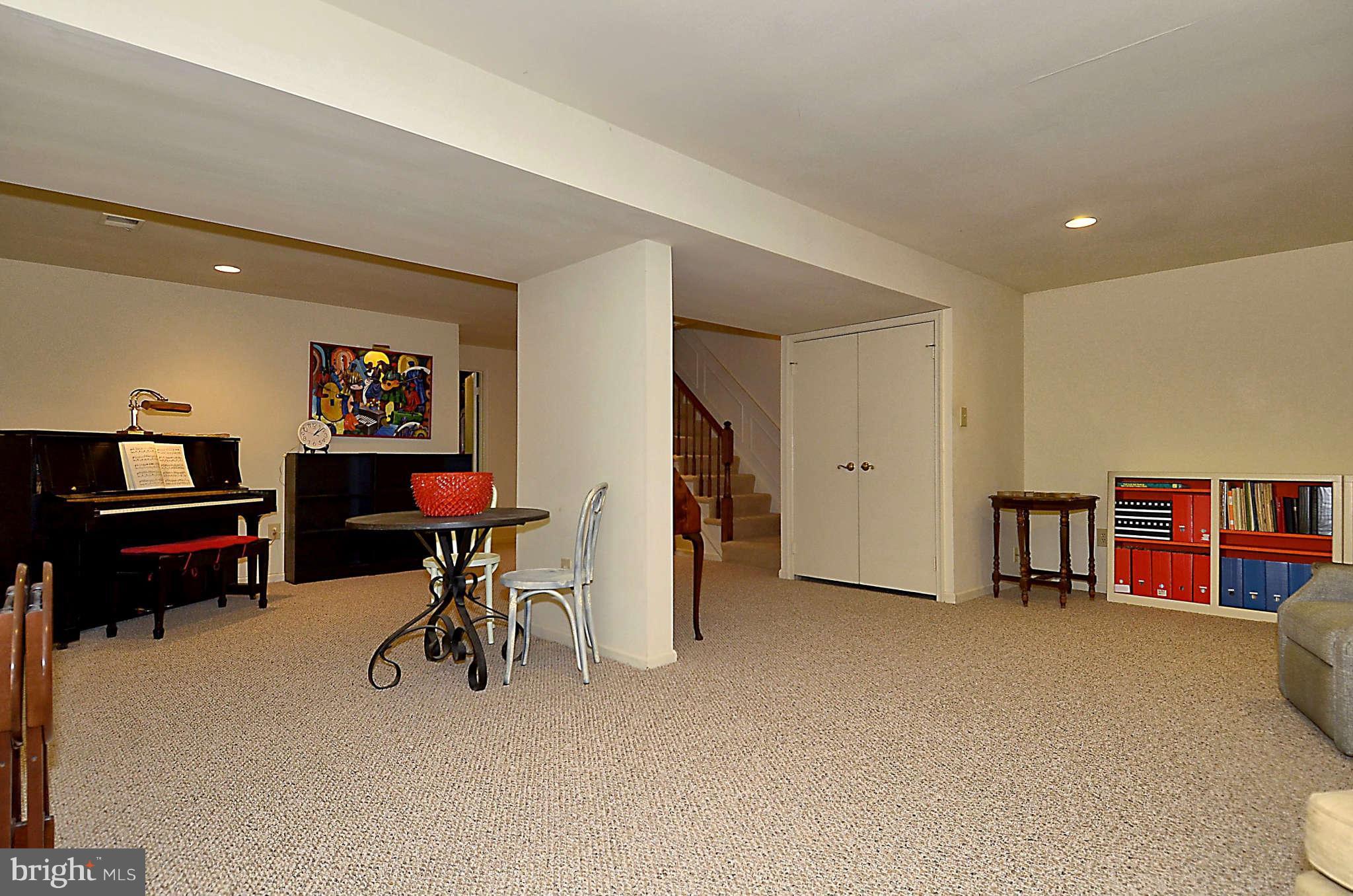 10708 Brewer House Road North Bethesda, MD 20852 - Photo 24 of 26 a living room with furniture and a gym