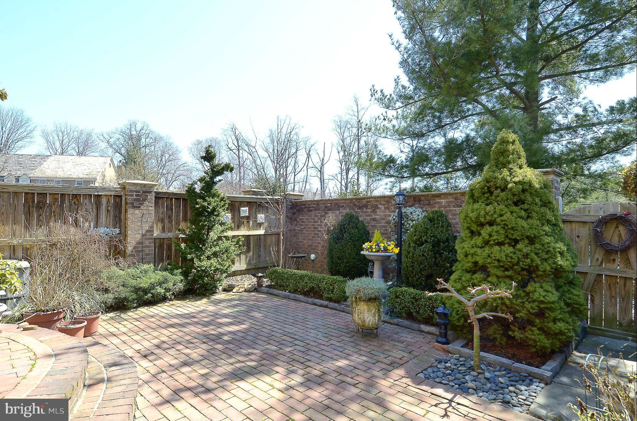 10708 Brewer House Road North Bethesda, MD 20852 - Photo 25 of 26 a front view of a house with garden