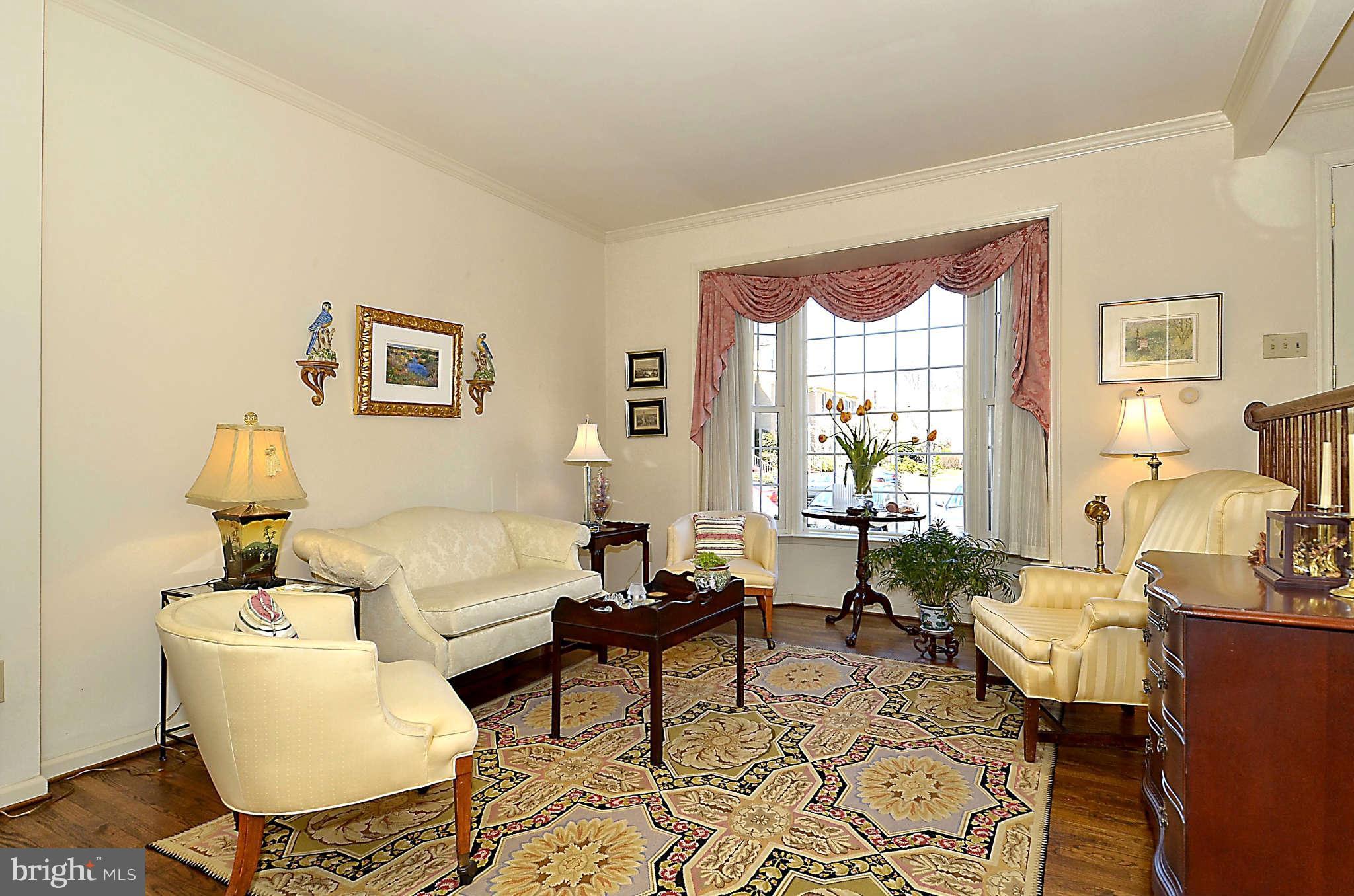 10708 Brewer House Road North Bethesda, MD 20852 - Photo 4 of 26 a living room with furniture and a large window