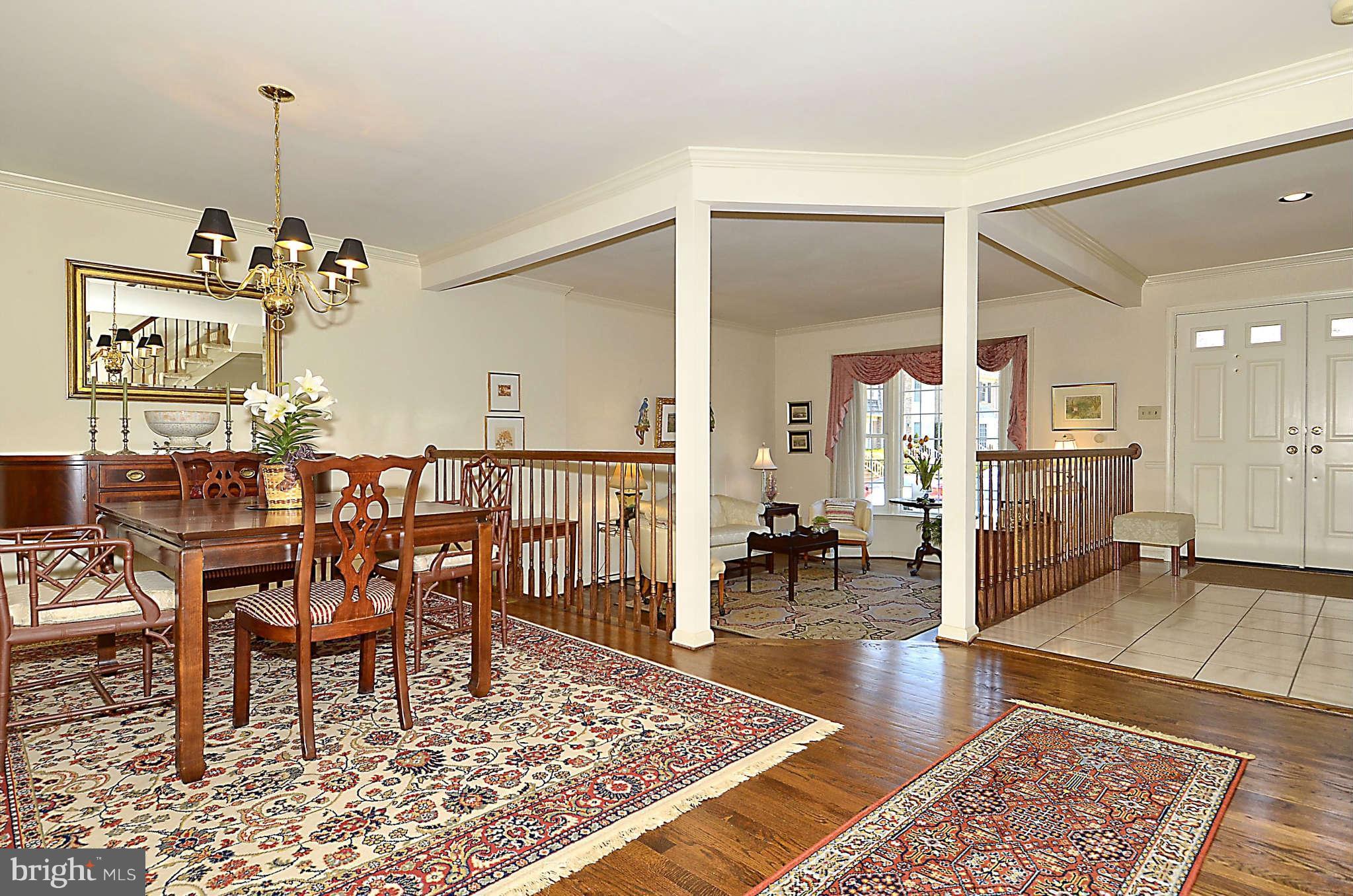10708 Brewer House Road North Bethesda, MD 20852 - Photo 6 of 26 a living room with dining room and wooden floor