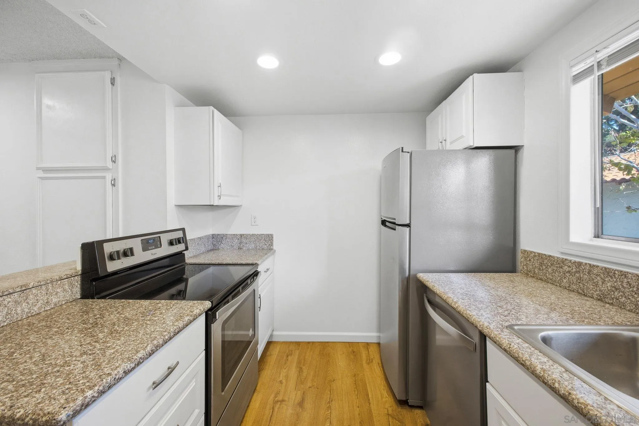 6019 Rancho Mission Road, Unit 204 San Diego, CA 92108 - Photo 16 of 38 Upgraded kitchen with stainless steel appliances