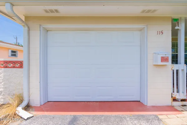 a bedroom with a bed and a cabinets