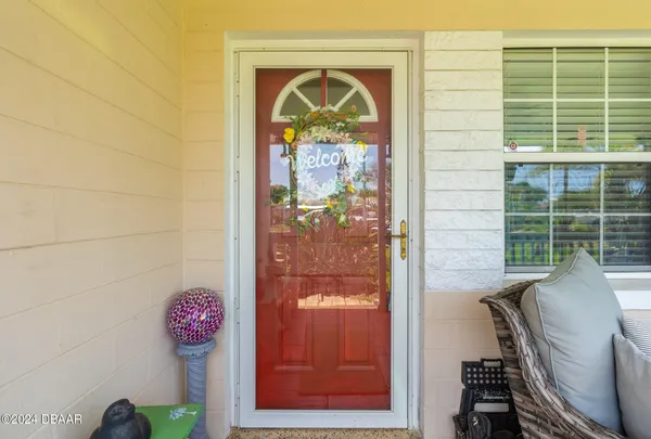 a view of a entryway door front of house