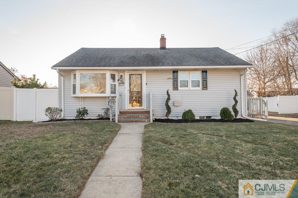 5 High Point Road East Brunswick, NJ 08816 - Photo 2 of 24 a front view of a house with a yard