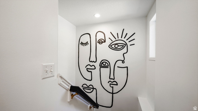 1285 Alpine Way Provo, UT 84606 - Photo 23 of 25 Recessed ceiling lighting, white wall finishes, and a small window for natural light