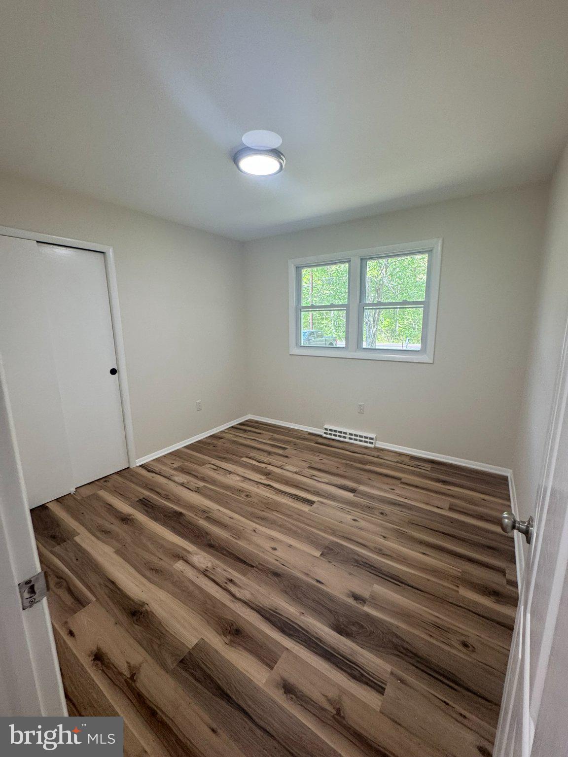 42249 St Johns Road Leonardtown, MD 20650 - Photo 4 of 10 Bright and airy room with new flooring.