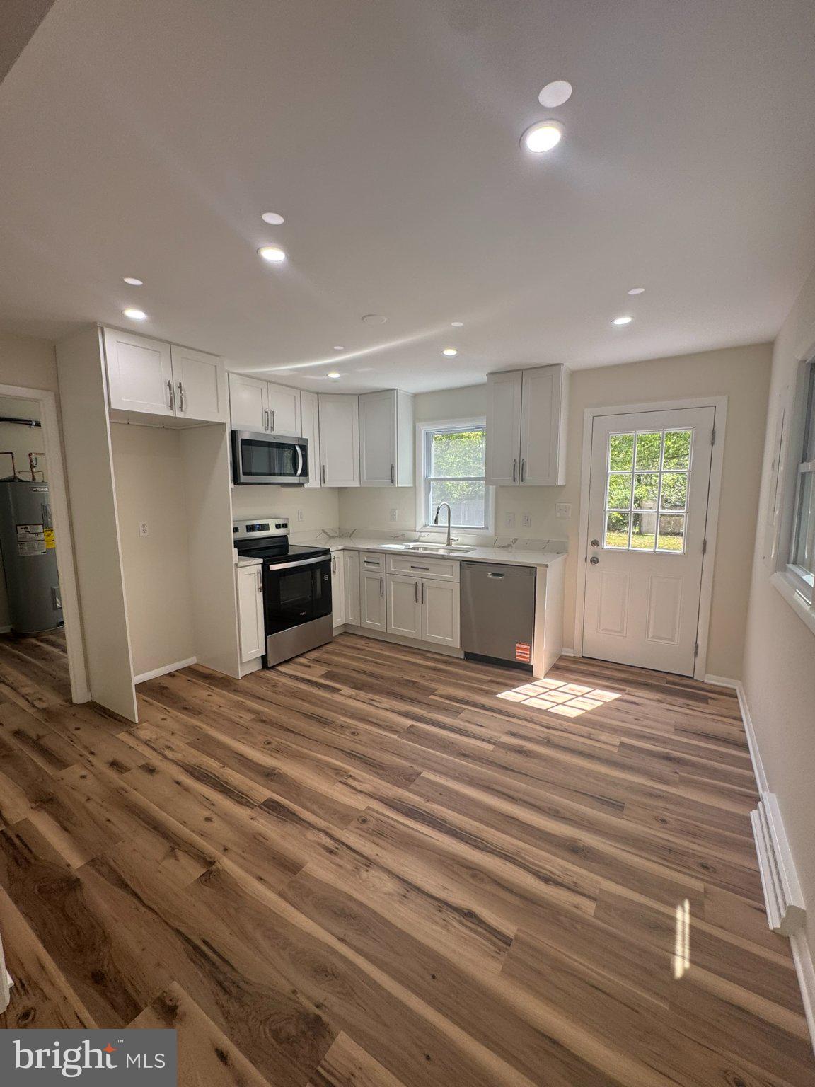 42249 St Johns Road Leonardtown, MD 20650 - Photo 9 of 10 Bright, modern kitchen with natural light.