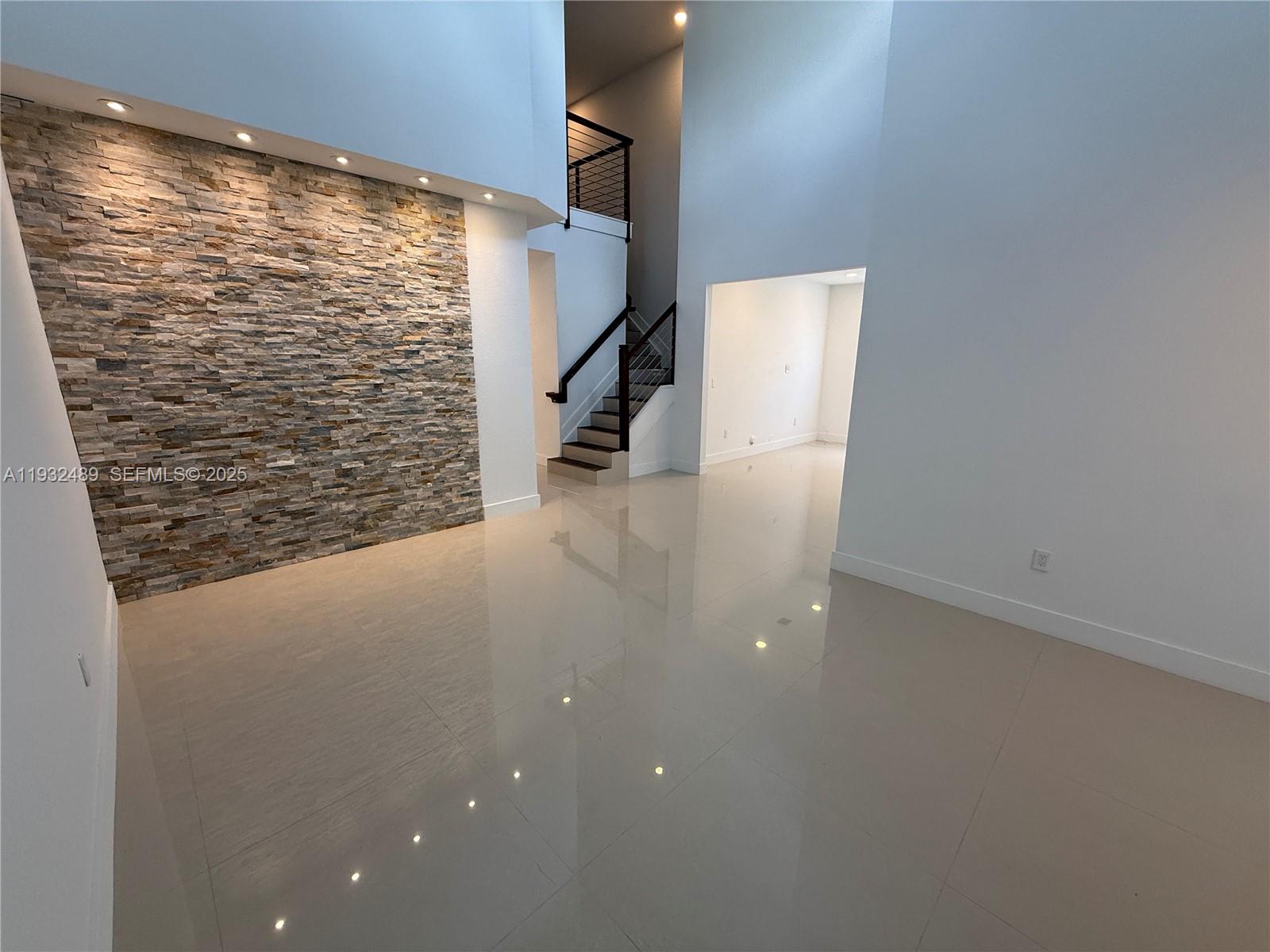 107 Southeast 22nd Terrace Homestead, FL 33033 - Photo 3 of 24 a view of water heater room