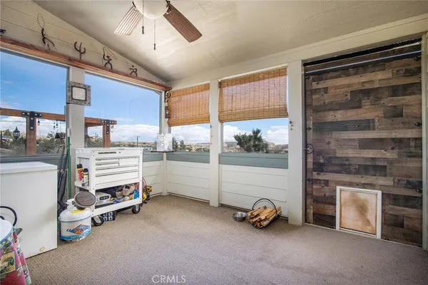 a view of a terrace with seating space