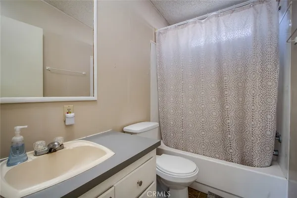 a view of a road with an ocean view