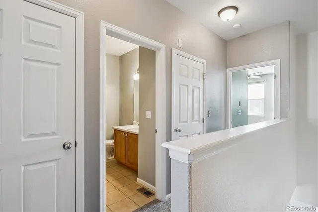 a bathroom with a tub and a sink