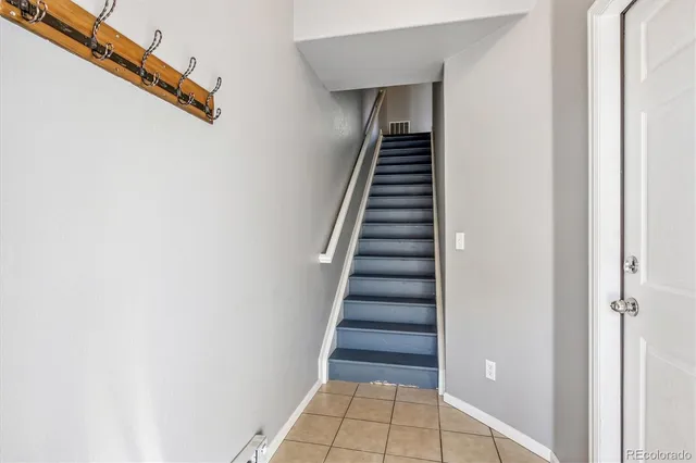 a view of an entryway with staircase