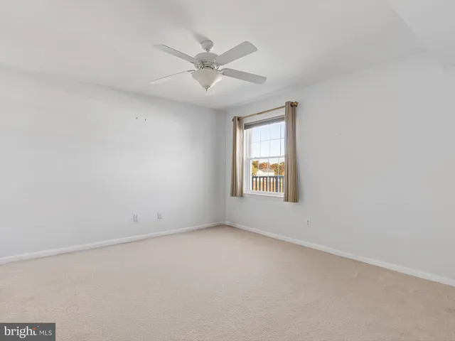 an empty room with a bathroom