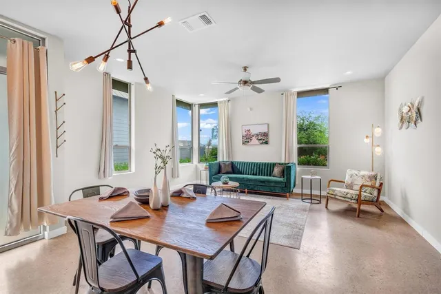 a view of a livingroom with furniture and window