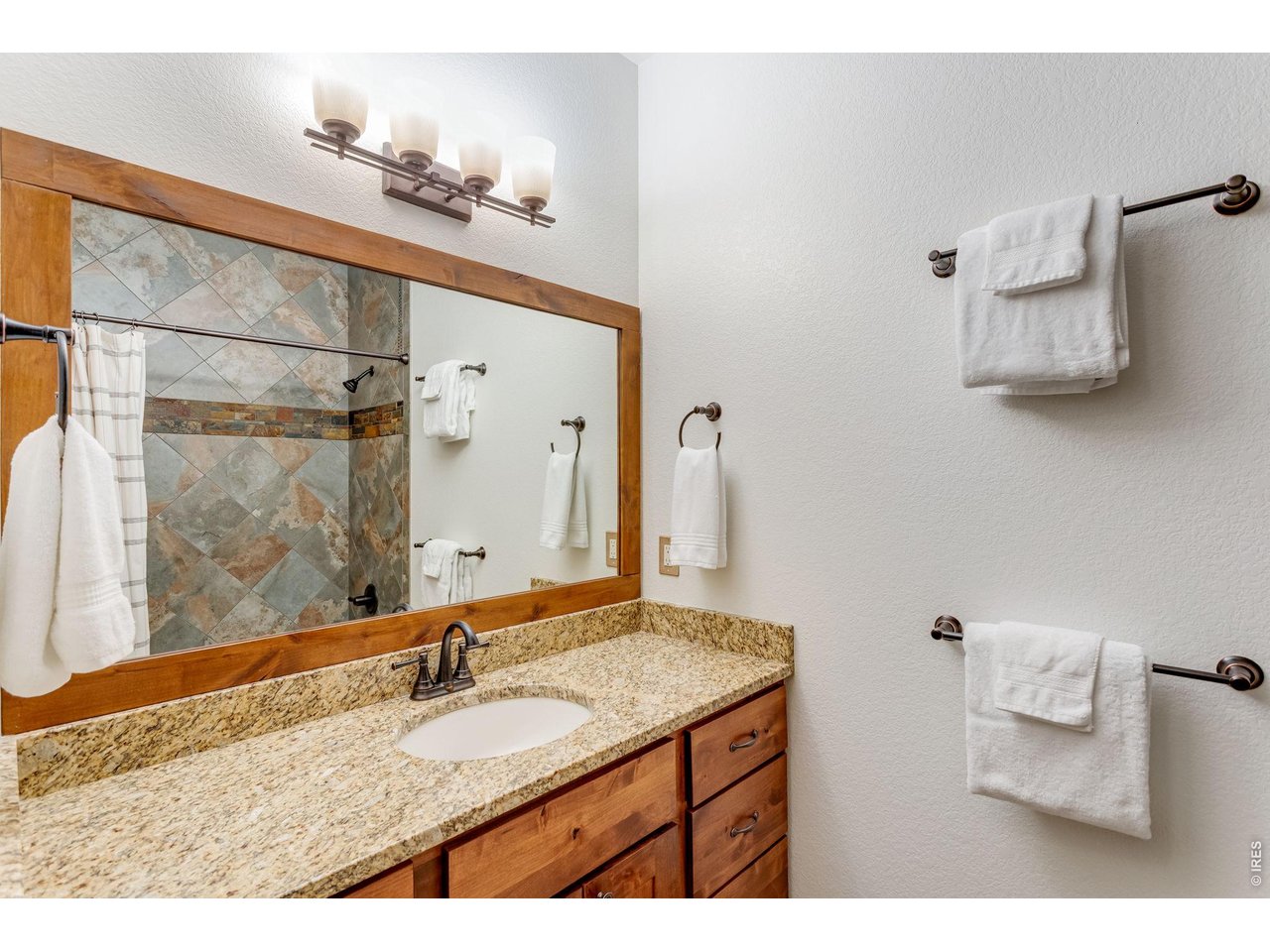 1127 Fish Creek Road Estes Park, CO 80517 - Photo 38 of 50 Downstairs full bathroom