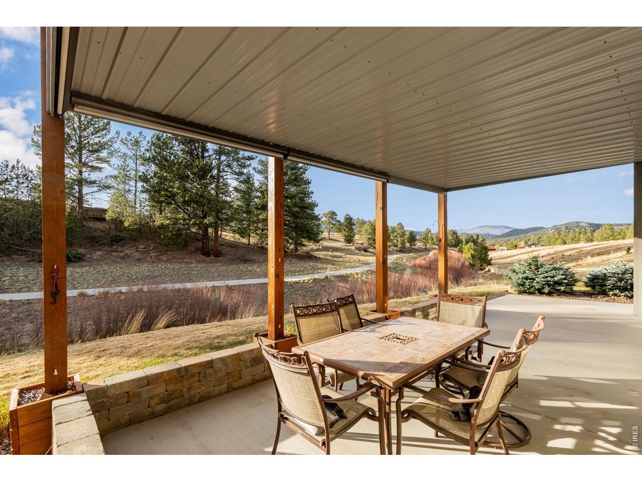 1127 Fish Creek Road Estes Park, CO 80517 - Photo 42 of 50 Downstairs patio