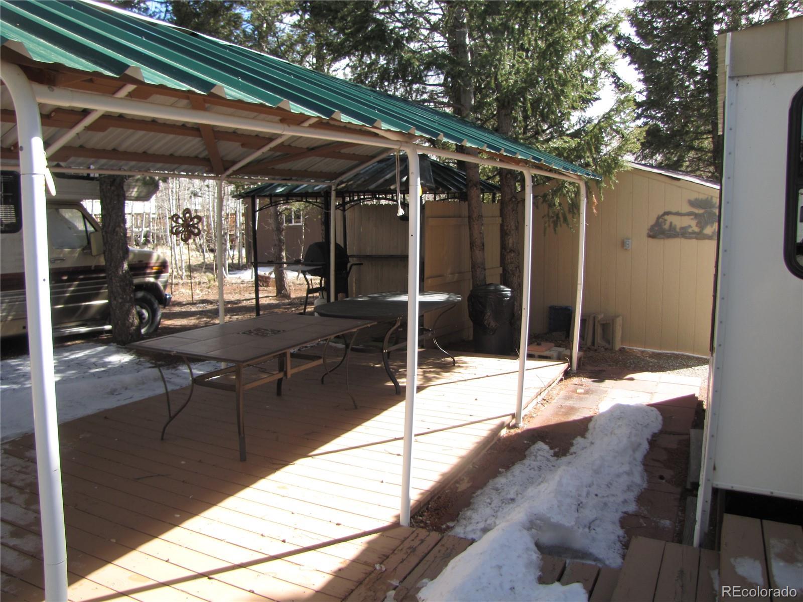 540 Lantern Loop Fairplay, CO 80440 - Photo 15 of 24 a patio with table and chairs
