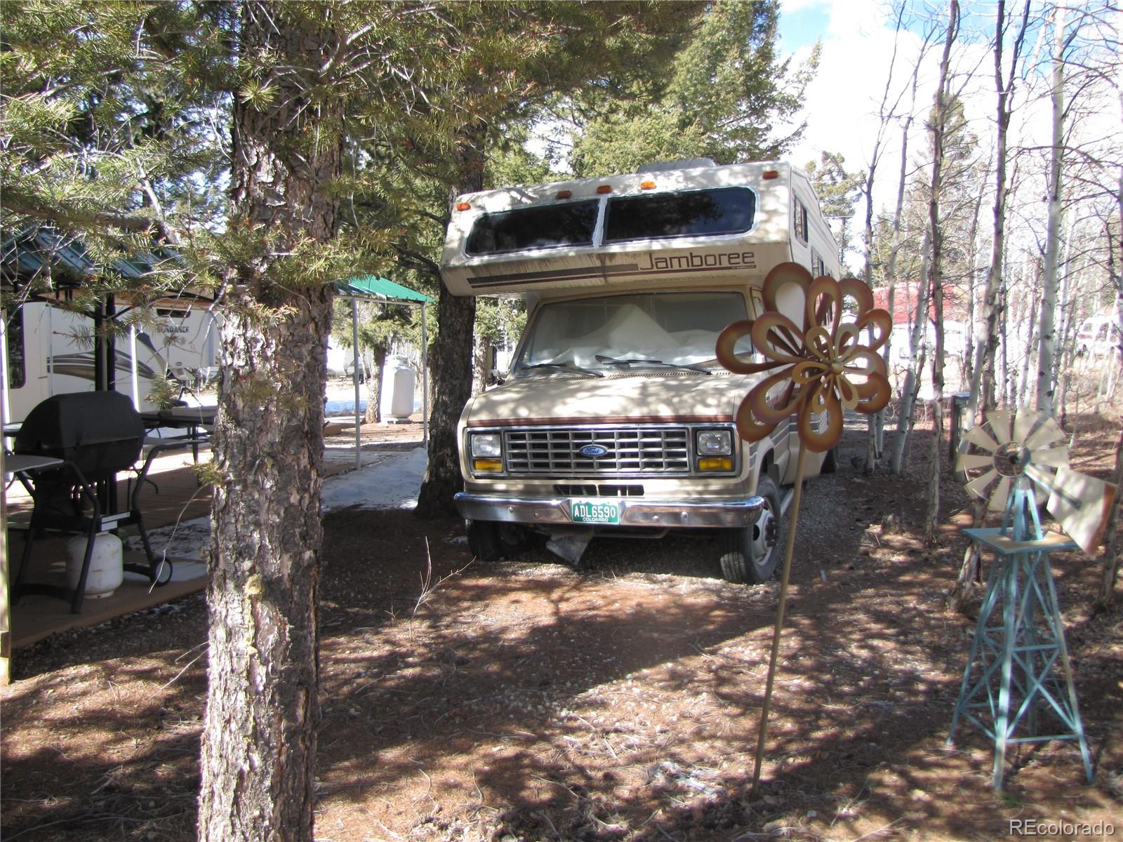 540 Lantern Loop Fairplay, CO 80440 - Photo 20 of 24 a car parked in front of a house