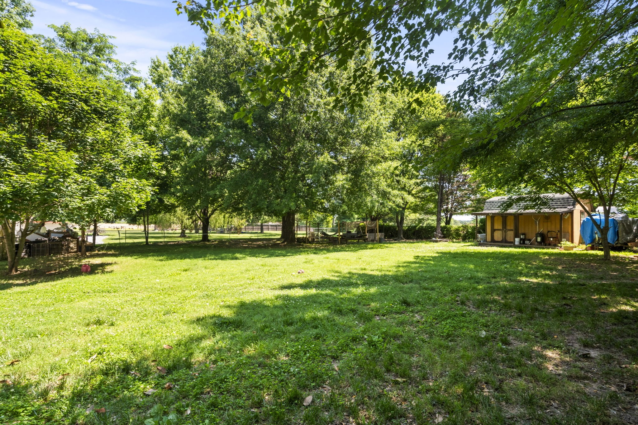 7324 Chowning Road Springfield, TN 37172 - Photo 24 of 30 a view of outdoor space with deck and trees