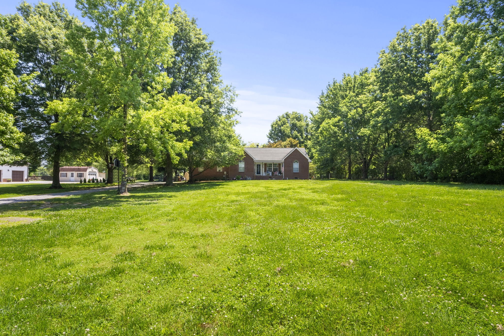 7324 Chowning Road Springfield, TN 37172 - Photo 5 of 30 a view of outdoor space with deck and trees