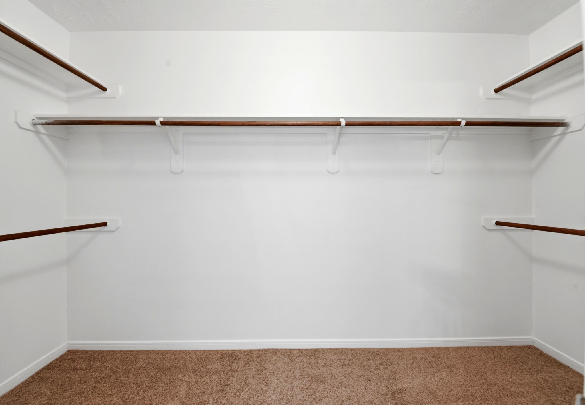22102 Bridgestone Crossing Drive Spring, TX 77388 - Photo 20 of 38 a view of a room with racks on the wall
