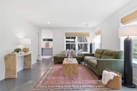 a living room with furniture and a couch
