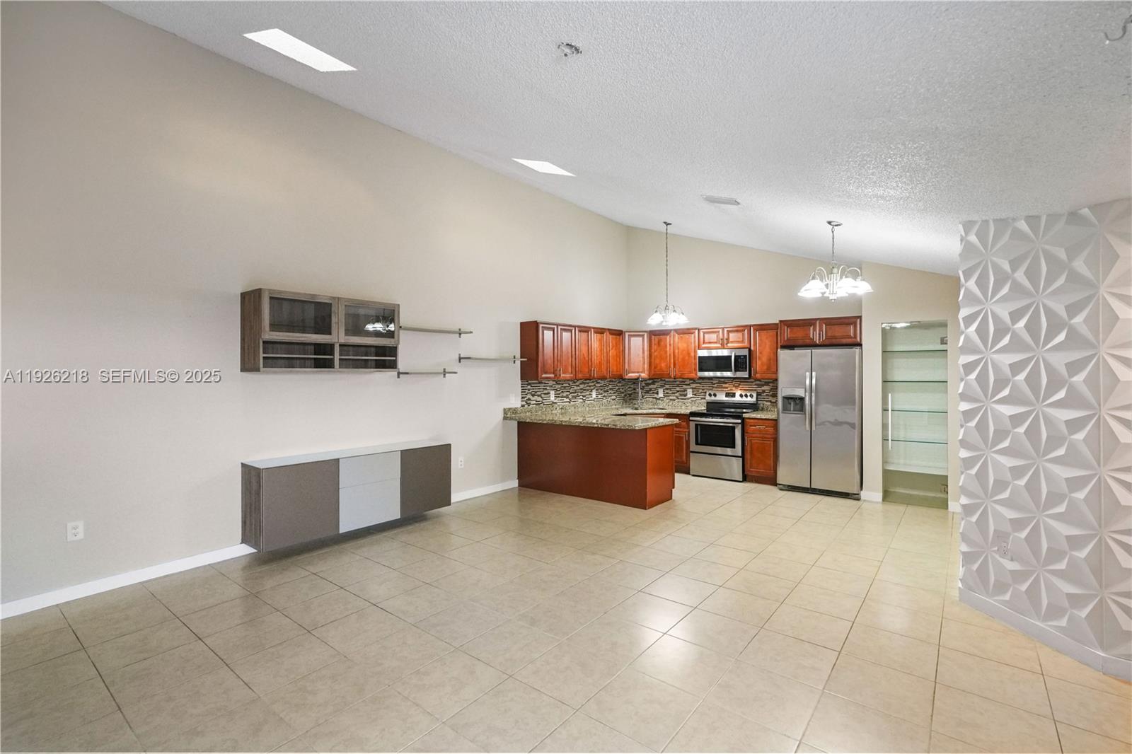 9568 Boca Gardens Parkway, Unit B Boca Raton, FL 33496 - Photo 11 of 71 a large kitchen with stainless steel appliances a counter top space cabinets and stainless steel appliances