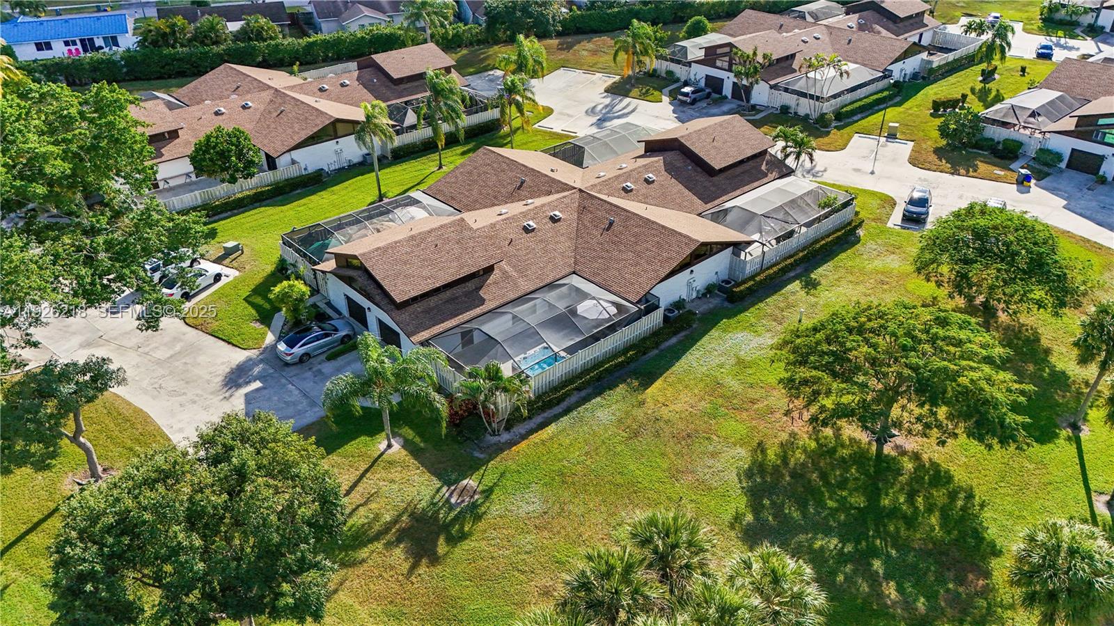 9568 Boca Gardens Parkway, Unit B Boca Raton, FL 33496 - Photo 55 of 71 an aerial view of residential houses with yard