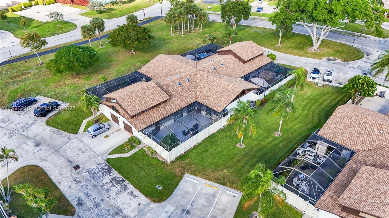 9568 Boca Gardens Parkway, Unit B Boca Raton, FL 33496 - Photo 62 of 71 an aerial view of a house with garden space and street view