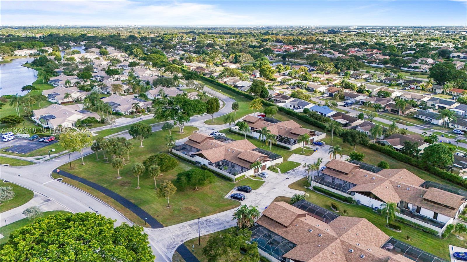 9568 Boca Gardens Parkway, Unit B Boca Raton, FL 33496 - Photo 66 of 71 an aerial view of residential houses with outdoor space