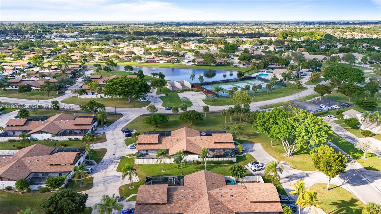 9568 Boca Gardens Parkway, Unit B Boca Raton, FL 33496 - Photo 69 of 71 an aerial view of residential houses with outdoor space