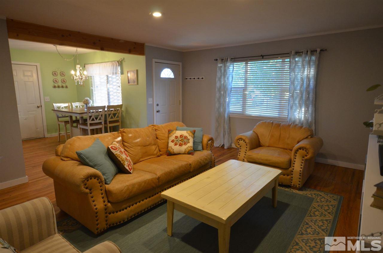 525 Ballentyne Way Reno, NV 89502 - Photo 10 of 22 a living room with furniture and a large window