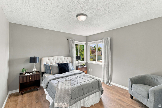 926 Ibis Way Draper, UT 84020 - Photo 18 of 41 Second bedroom with corner windows overlooking the backyard with big walk in closet.