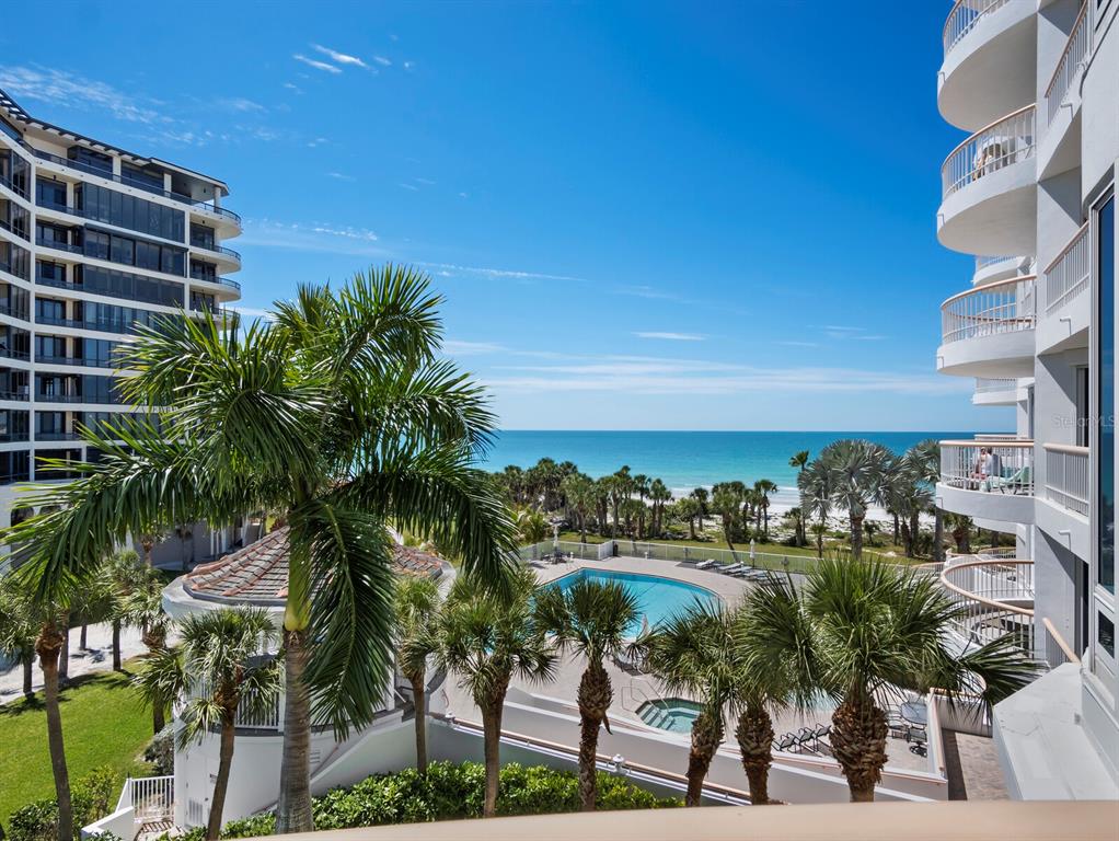 455 Longboat Club Road, Unit 402 Longboat Key, FL 34228 - Photo 9 of 48 a view of a lake