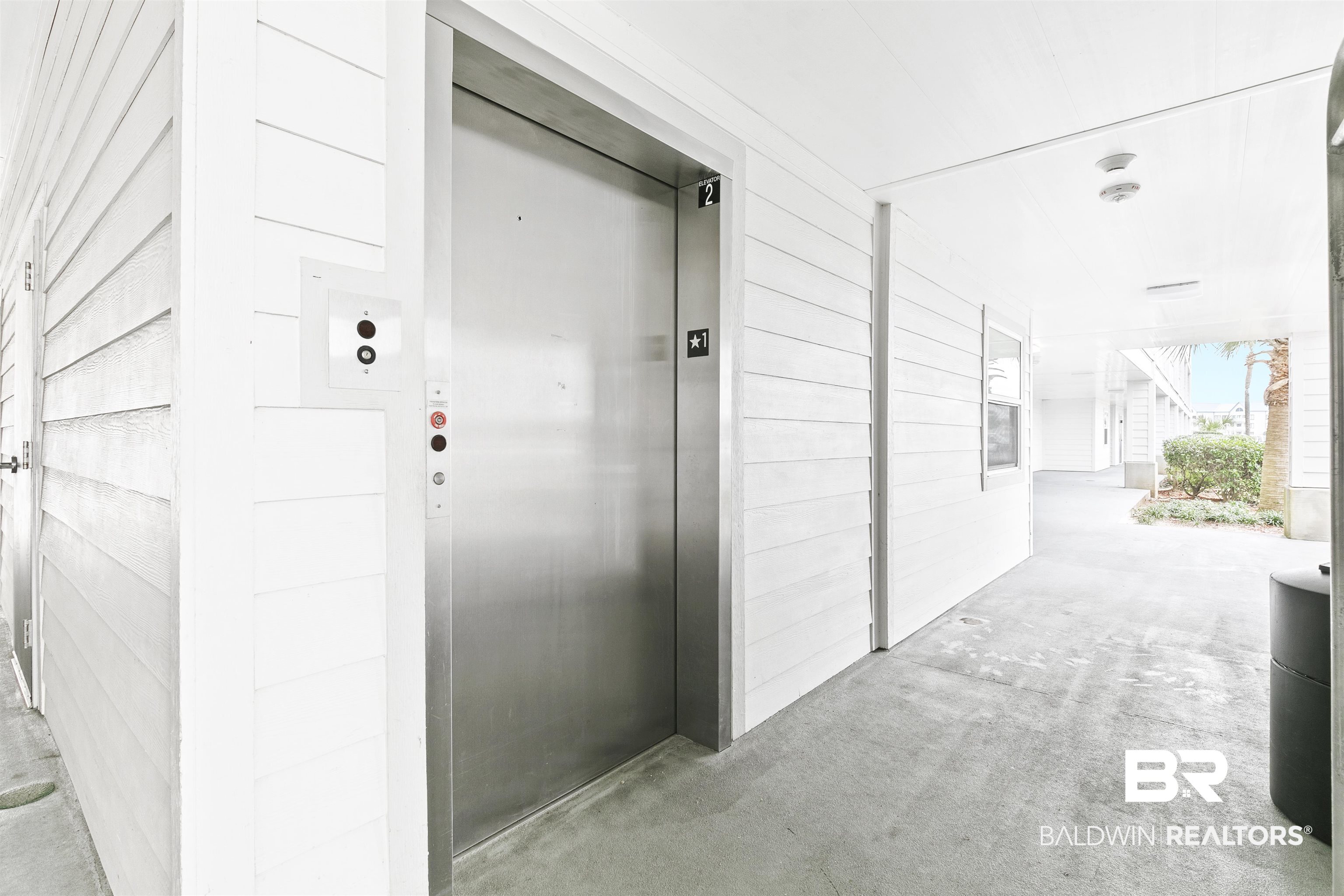 400 Plantation Road, Unit 3314 Gulf Shores, AL 36542 - Photo 32 of 47 View of exterior entry featuring elevator
