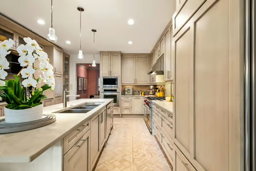311 Ridgewood Road Austin, TX 78746 - Photo 13 of 38 a large white kitchen with lots of counter top space