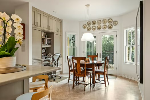 311 Ridgewood Road Austin, TX 78746 - Photo 16 of 38 a view of a dining room with furniture window and outside view