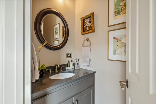 311 Ridgewood Road Austin, TX 78746 - Photo 19 of 38 a bathroom with a sink and a mirror