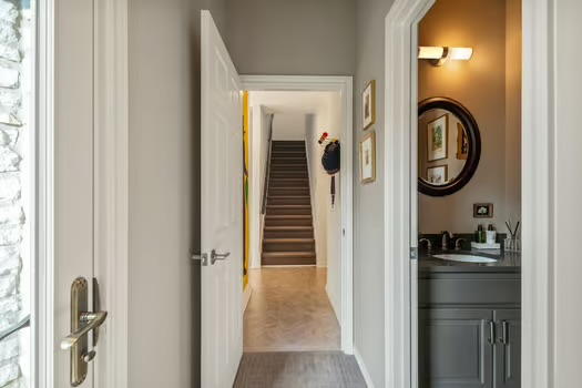 311 Ridgewood Road Austin, TX 78746 - Photo 20 of 38 a view of a bathroom from a hallway