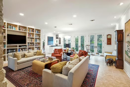 311 Ridgewood Road Austin, TX 78746 - Photo 7 of 38 a living room with furniture and a flat screen tv
