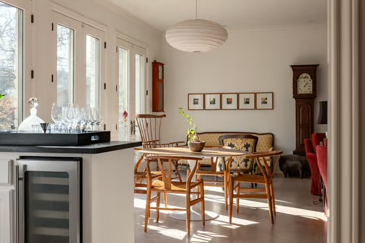 311 Ridgewood Road Austin, TX 78746 - Photo 9 of 38 a view of a kitchen with granite countertop a table and chairs in it